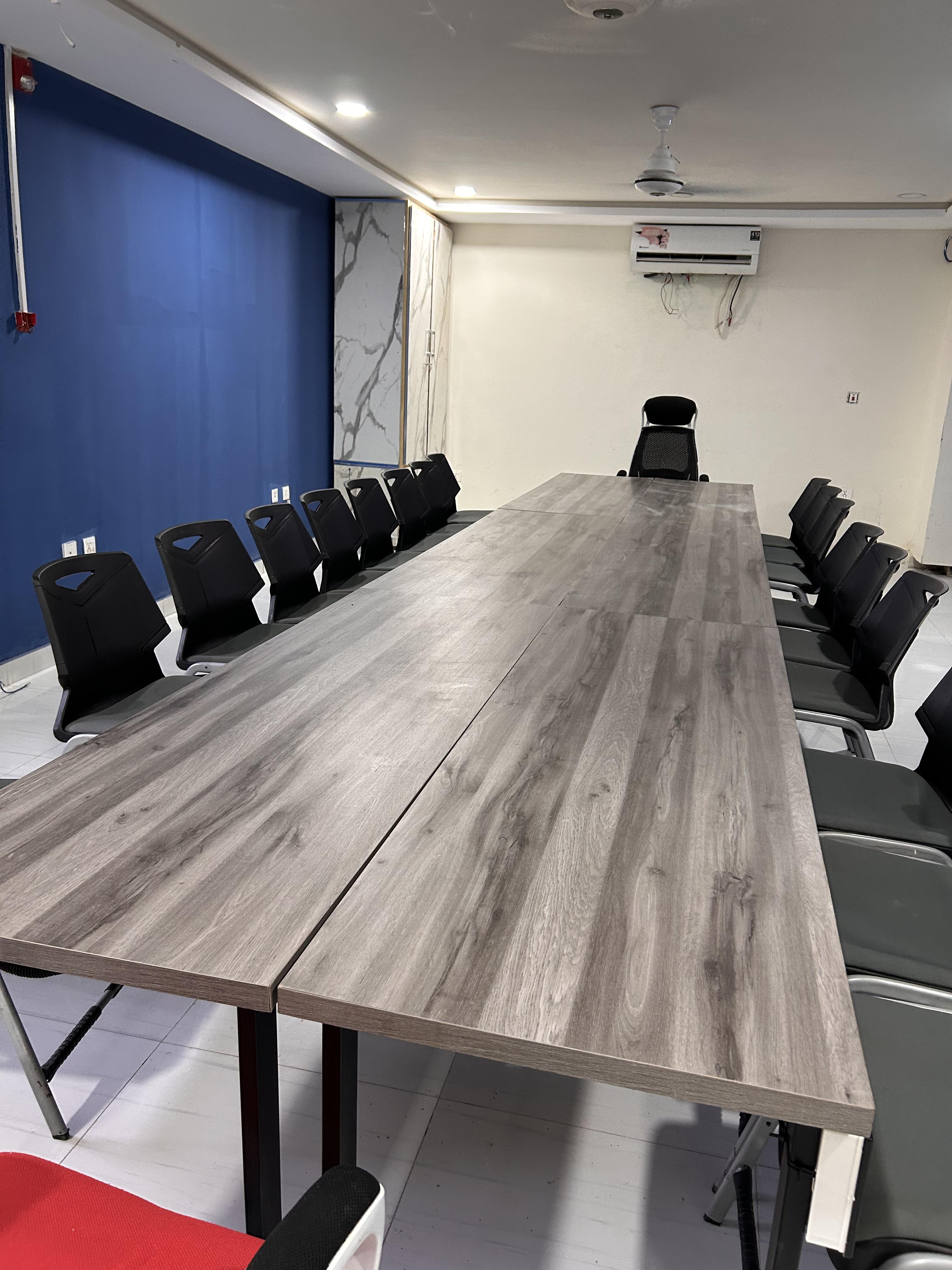Conference room chairs arranged for attendees
