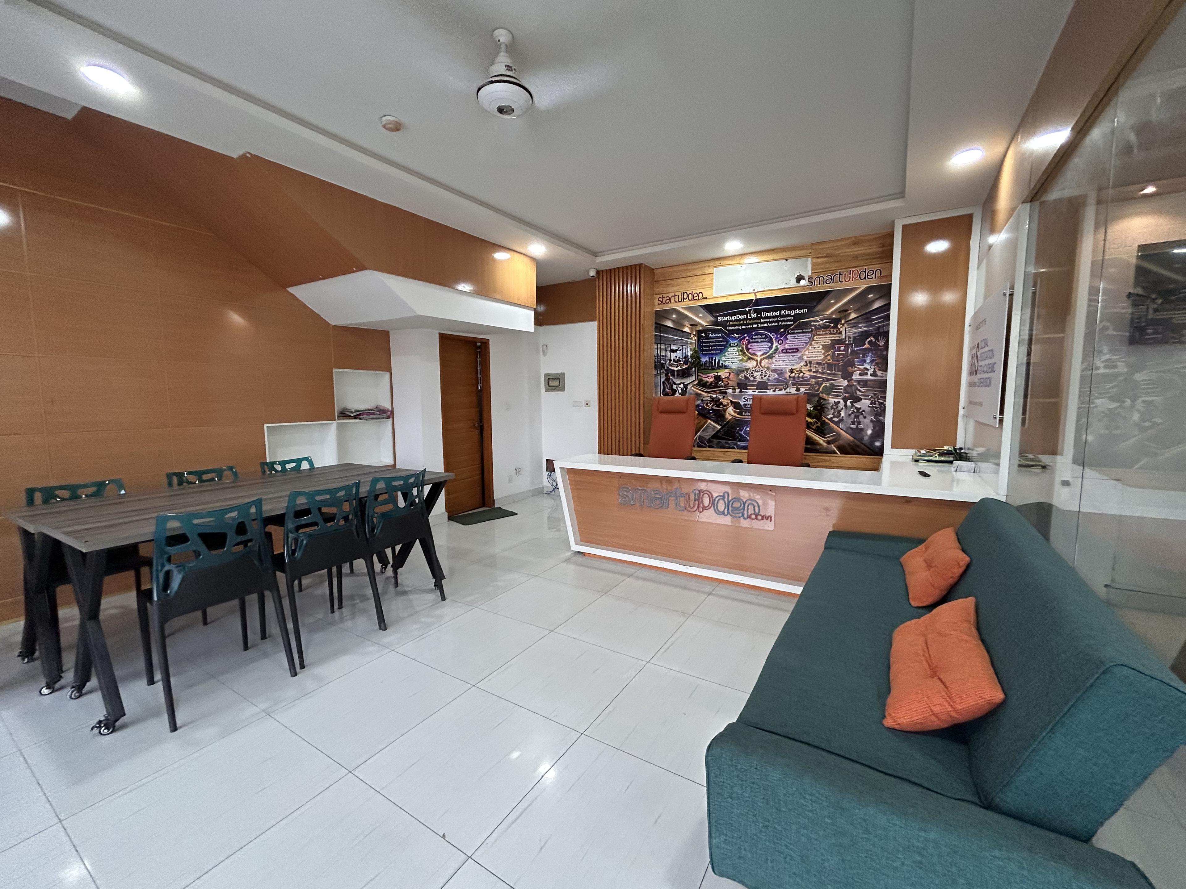 Premium reception area with modern desk and warm lighting