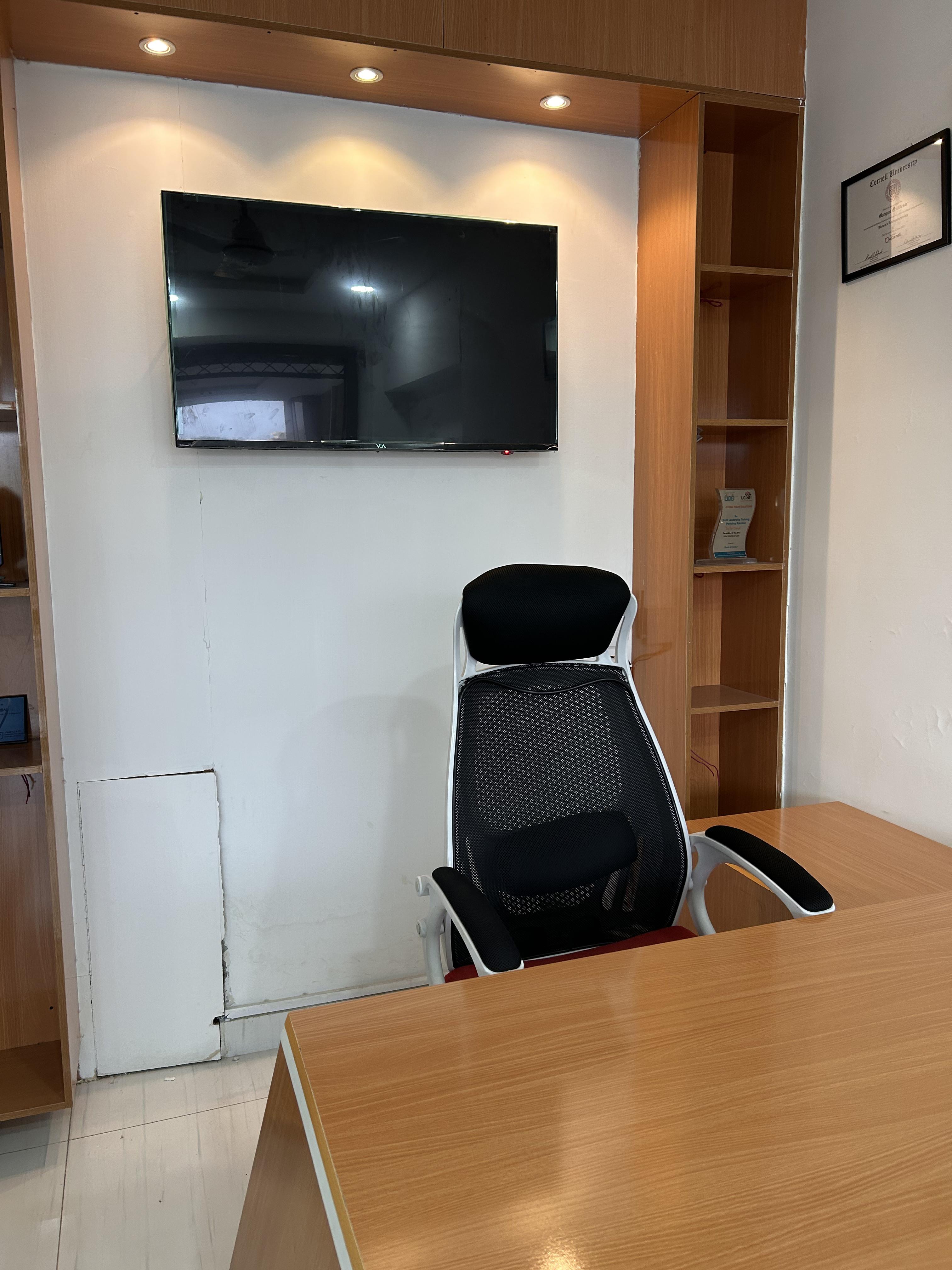 Angled view of furnished ground floor office setup